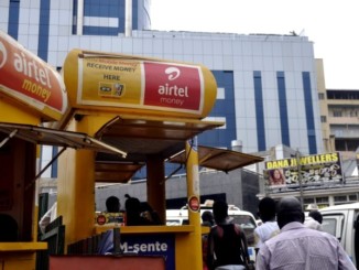 A mobile money kiosk in downtown Kampala. Credit: Edgar Batte/Uganda Business News