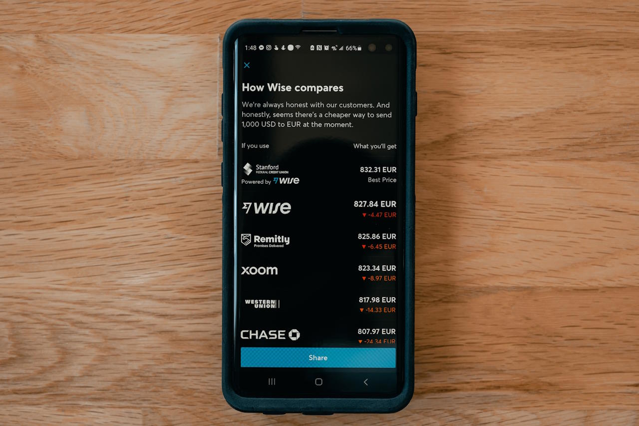 Smartphone screen showing a comparison of money transfer services