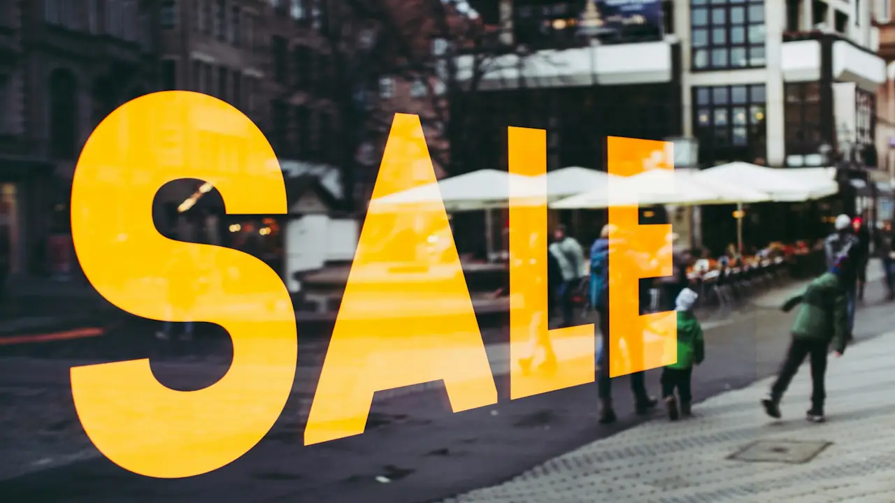 A store advertising a sales promotion, seen from the street