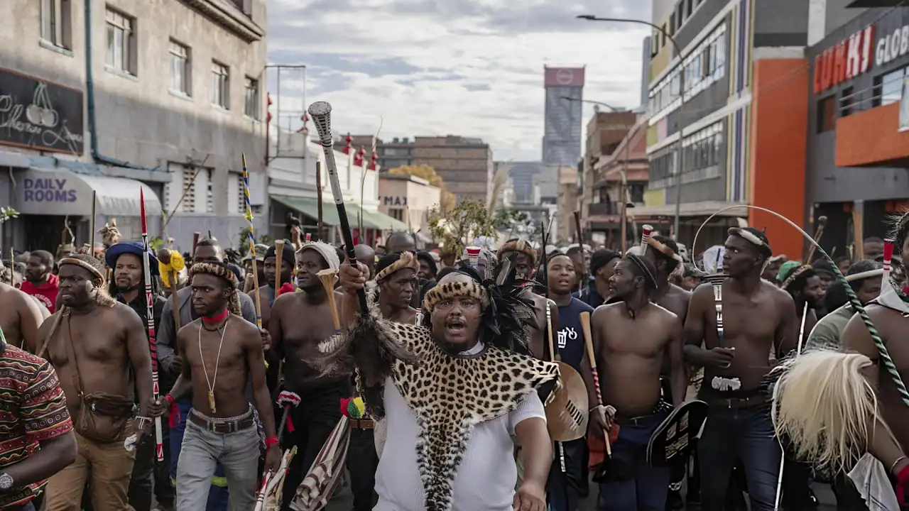 Anti-immigration demonstrators, wearing traditional Zulu attire, gather to stage a protest in Johannesburg, South Africa on 29 April, 2026. Participants voiced opposition to irregular migration during the demonstration.