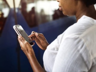 A female person using a smart phone