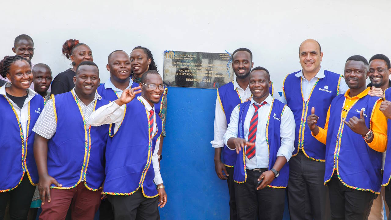 Majid Al Futtaim Hypermarkets Uganda Ltd staff handover 3 classroom blocks to the founder and director of Angella Nakato, founder and director of Noah's Ark Village. Carrefour, owned and operated by Majid Al Futtaim in Uganda, has officially launched its latest 'Round Up Your Bill' campaign with an event at Noah's Ark Village in Entebbe. 'Round Up Your Bill' allows customers to make donations that support vulnerable groups in neighbouring communities as part of the brand's mission to drive positive change.