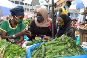 Market vendors in Uganda wearing masks to protect against Covid-19 coronavirus