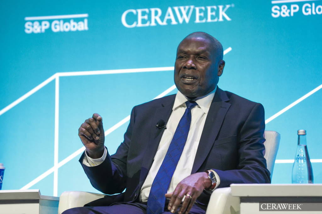 A male speaker at a panel discussion