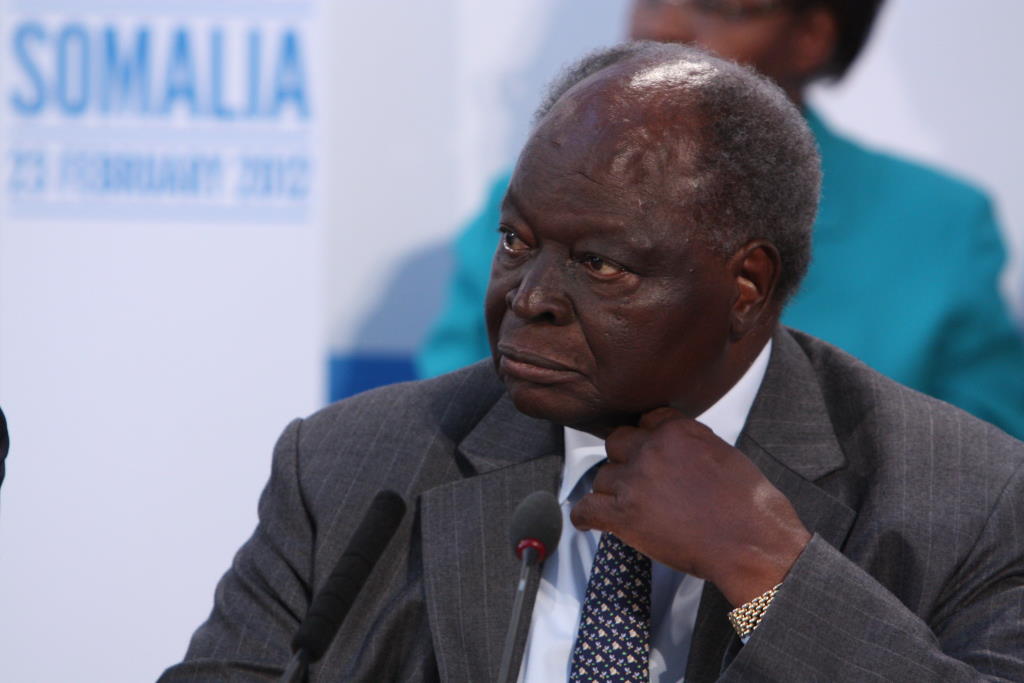 Mwai Kibaki at a conference in London, in 2012