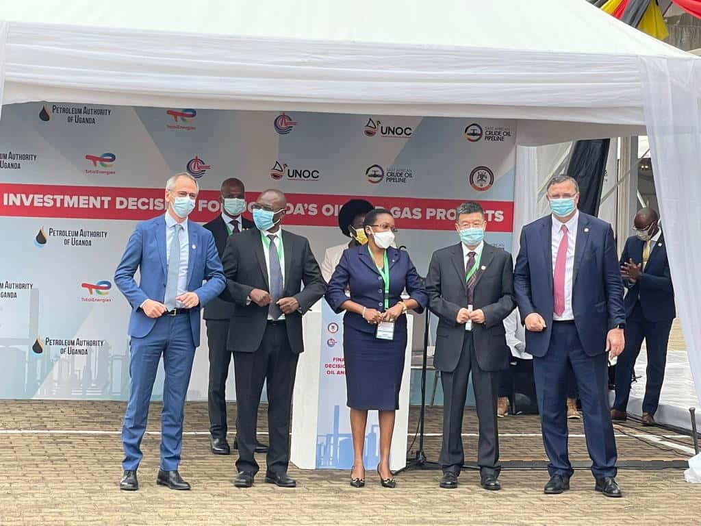 A group photo of oil company executives in Kampala, Uganda