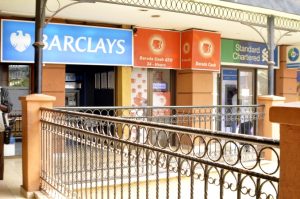 Signboards of banks at Oasis Mall in Kampala.