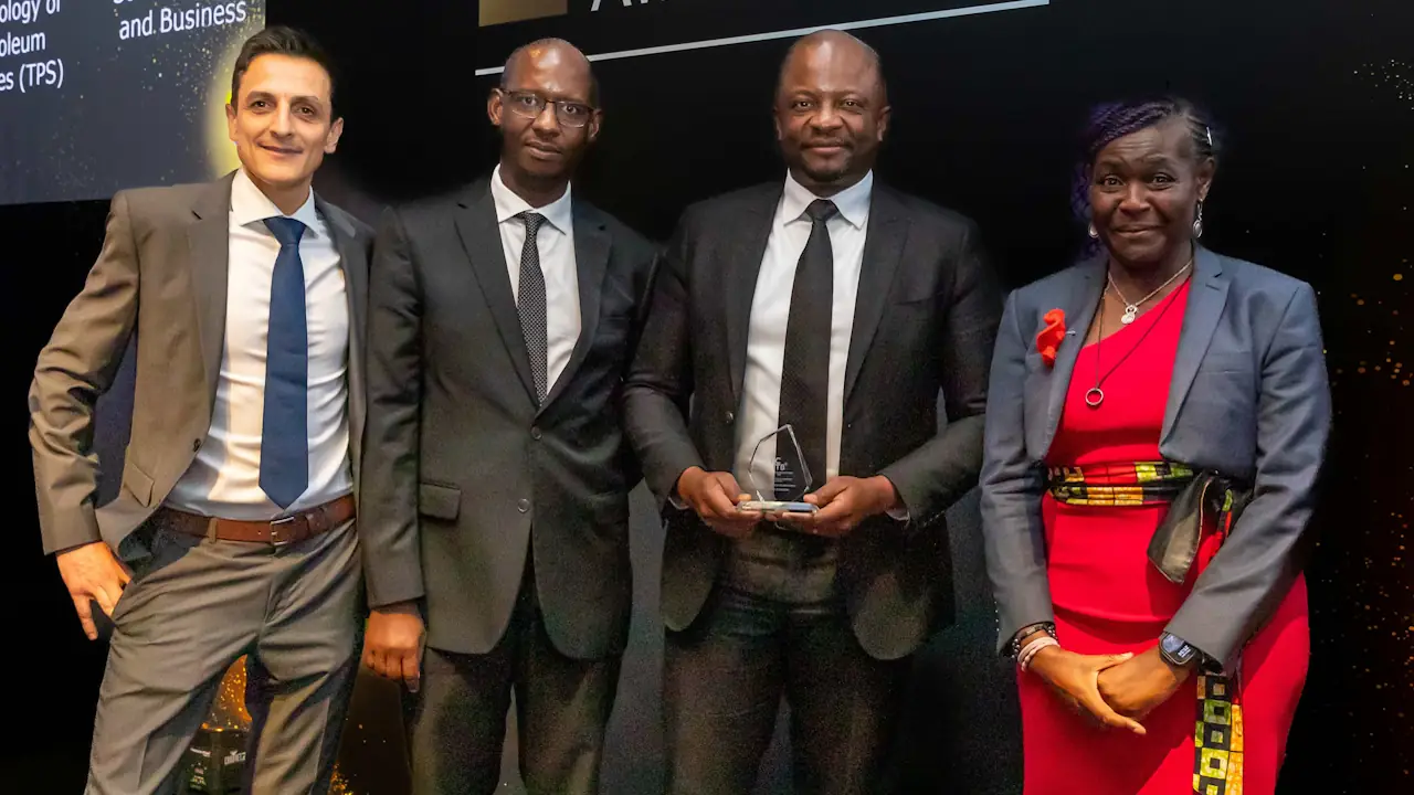 Solid Rock employees - three men on the left, and a woman on the right - with its regional award at the ECI Awards
