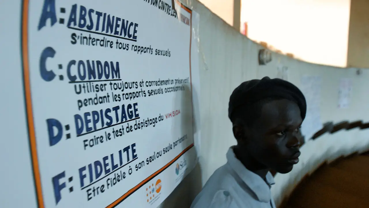 The Central African Republic has one of the highest HIV infection rates in the region. To help stop the spread of the disease, humanitarian and development organisations are teaching young people — like the scout in this September 2007 photo — about risks and prevention.