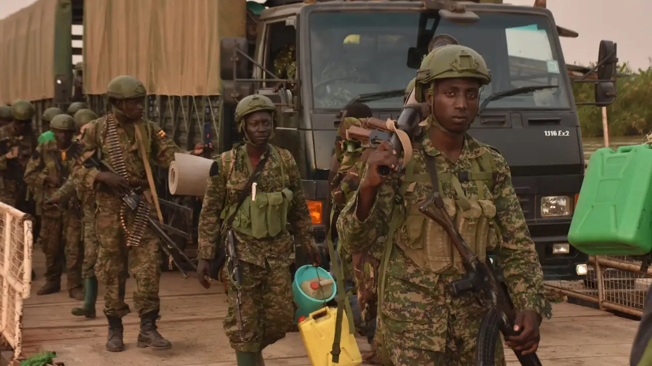 UPDF combat vehicles and soldiers cross to Burasi in the Democratic Republic of Congo using the newly installed ferry at the Haibale landing point on the Semliki River in February 2022. Presiding over the opening ceremony at the Burasi landing site in DRC, the Operation Shujja commander, Major General Kayanja Muhanga, noted that the crossing into Congo using this access route marks the beginning of the second phase of the operation. Maj. Gen. Kayanja revealed that the road from Burasi to Boga, a stretch of about 50km that was previously impassable, is being worked on jointly by both the UPDF and the FARDC (Congolese national army)."