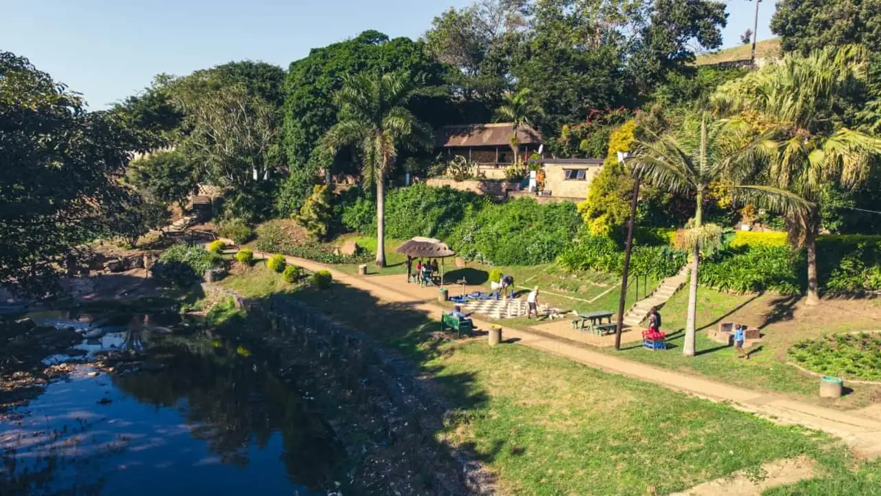 A river in the city of eThekwini in South Africa's KwaZulu-Natal province. eThekwini is addressing climate risks in the Greater Durban area by restoring rivers and implementing community-led management programmes. In addition to collecting more than 100 tonnes of waste and clearing 98 hectares of invasive species, the nature-based initiative has created more than 1,000 jobs since its launch in 2022.